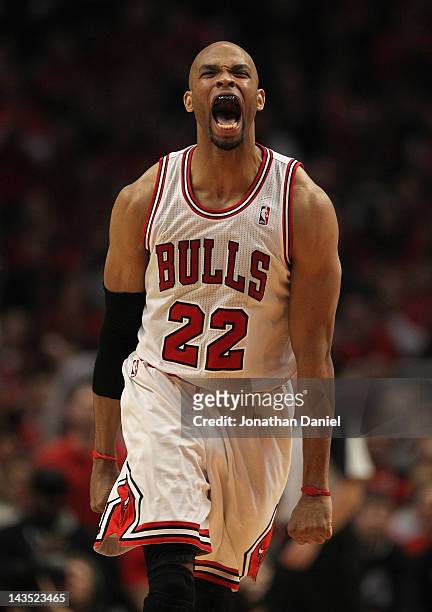 Taj Gibson of the Chicago Bulls celebrates hitting a shot against the Philadelphia 76ers in Game One of the Eastern Conference Quarterfinals during...