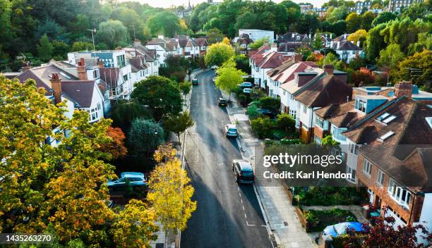 autumn colours on a london street - district stock pictures, royalty-free photos & images