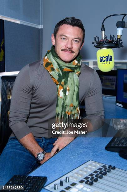 Luke Evans visits Bauer Media at 1 Golden Square on October 21, 2022 in London, England.