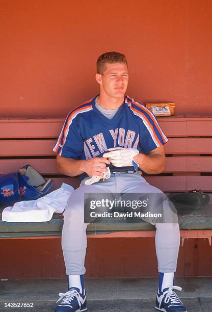 Lenny Dykstra of the New York Mets sits in the dugout before a Major League Baseball game against the San Francisco Giants played during August 1988...