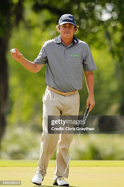 Jason Dufner reacts after making a putt for birdie on the 15th hole during the third round of the Zurich Classic of New Orleans at TPC Louisiana on...