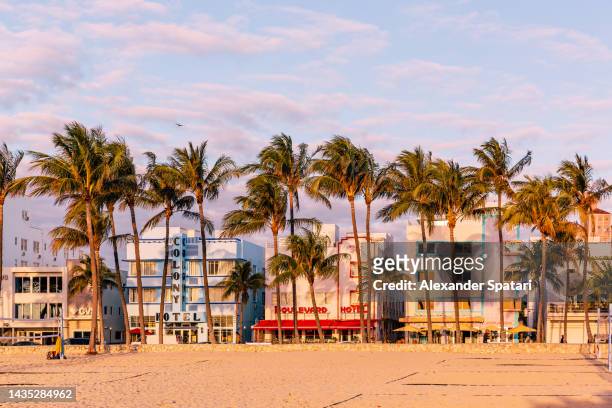 art deco hotels along the ocean drive in the morning, south beach, miami, usa - miami beach ストックフォトと画像