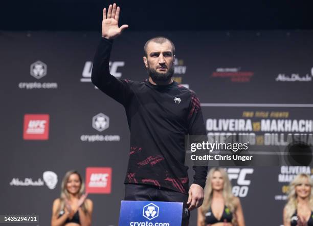 Abubakar Nurmagomedov of Russia poses on the scale during the UFC 280 ceremonial weigh-in at Etihad Arena on October 21, 2022 in Abu Dhabi, United...