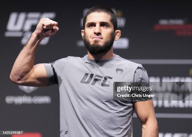 Islam Makhachev of Russia poses on the scale during the UFC 280 ceremonial weigh-in at Etihad Arena on October 21, 2022 in Abu Dhabi, United Arab...