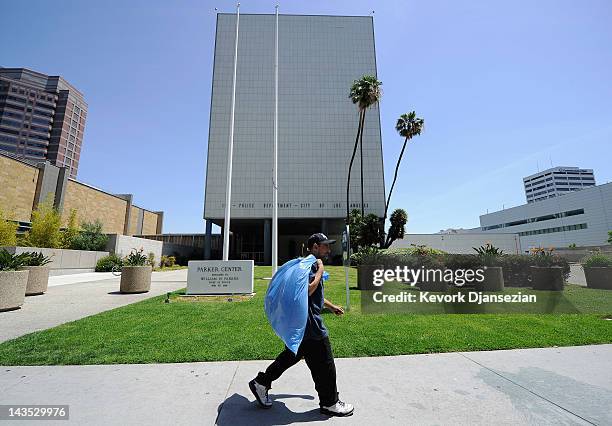 Man walks past the now empty Los Angeles Police Department headquarters, Parker Center, which was one of the flash points of the 1992 Los Angeles...