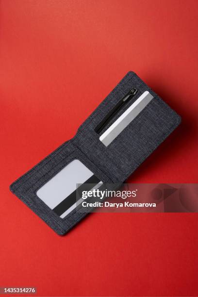 the grey wallet on isolated red background. mockup for your design. design element with copy space. - credit card mockup stock pictures, royalty-free photos & images