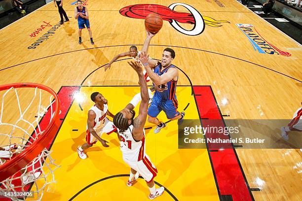 Landry Fields of the New York Knicks shoots against Ronny Turiaf of the Miami Heat in Game One of the Eastern Conference Quarterfinals during the...