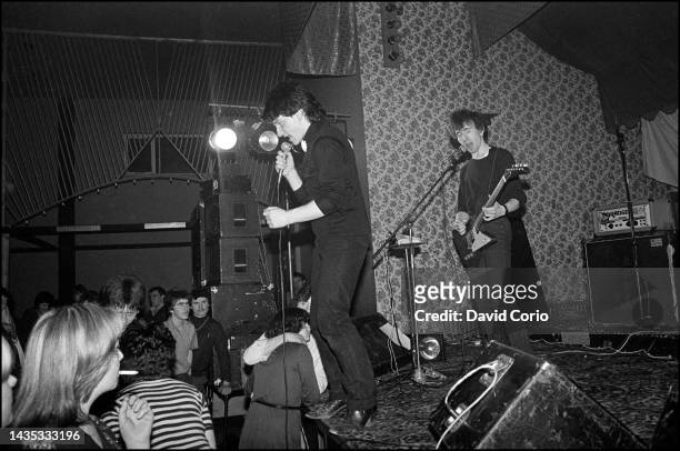 Singer Bono and guitarist The Edge, of U2 performing at the Garden of Eden club, Tullamore, Ireland, 2nd March 1980.