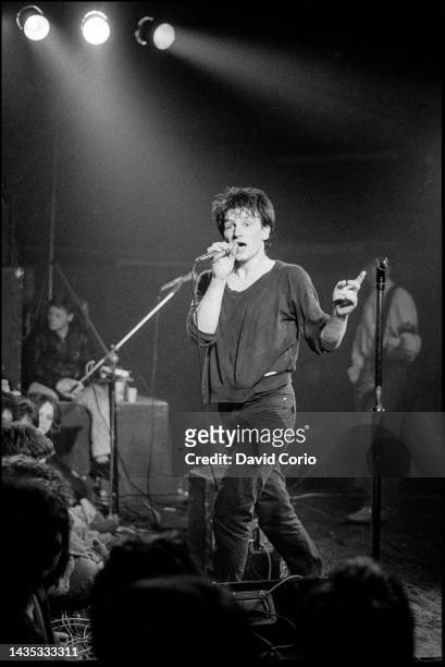 Singer Bono of U2 performing on stage at the Arcadia Ballroom, Cork, Ireland, 1st March 1980.
