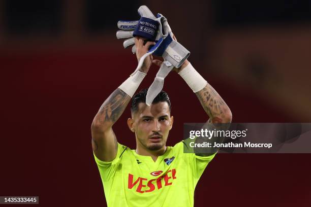 Ugurcan Cakir of Trabzonspor applauds the fans following the final whistle of the UEFA Europa League group H match between AS Monaco and Trabzonspor...