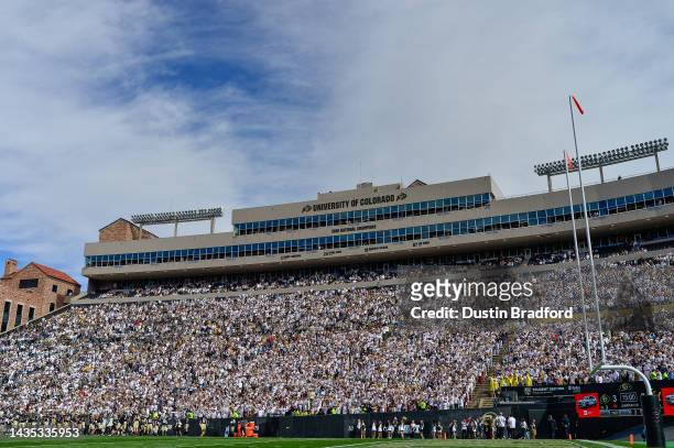 Fans dress in all-white in a general view during a game between the Colorado Buffaloes and the California Golden Bears at Folsom Field on October 15,...