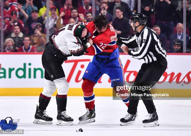 Arber Xhekaj of the Montreal Canadiens fights with Zack Kassian of the Arizona Coyotes during the first period at Centre Bell on October 20, 2022 in...