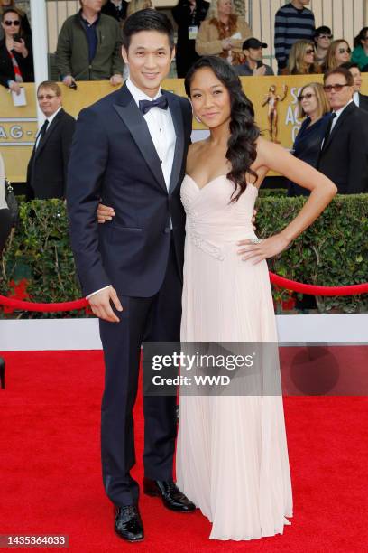 Harry Shum Jr. And Shelby Rabara attend the 19th annual Screen Actors Guild Awards at the Shrine Exposition Center.