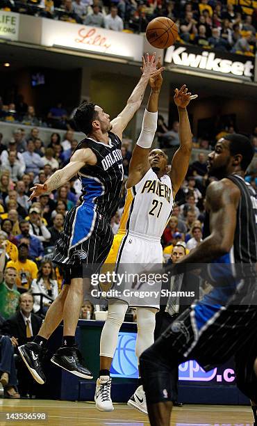 David West of the Indiana Pacers gets a jump shot off over J.J. Redick of the Orlando Magic in Game One of the Eastern Conference Quarterfinals...