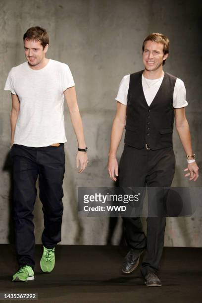 Fashion designer Marcus Wainwright and David Neville on the runway at Rag & Bone\'s fall 2013 menswear show.