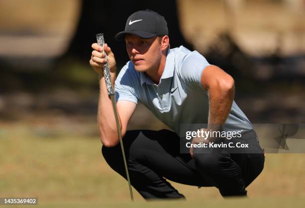 Cameron Davis of Australia lines up a putt on the 17th green during the second round of the CJ Cup at Congaree Golf Club on October 21, 2022 in...