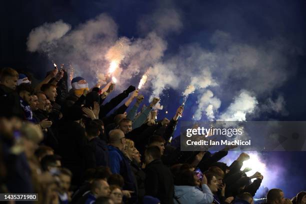 Fans of St. Johnstone FC light flares in the stands prior to the Cinch Scottish Premiership match between Hibernian FC and St. Johnstone FC at on...