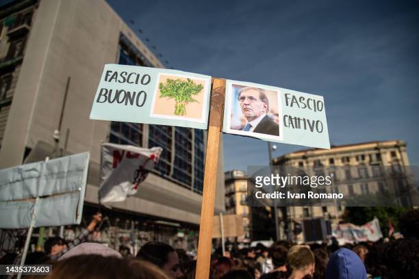 Girl shows a placard against fascism on which the president of the Senate Ignazio Benito Maria La Russa is portrayed during an anti-fascist student...