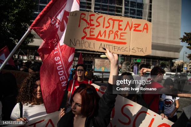 Girl shows a sign praising the anti-fascist resistance during an anti-fascist student protest on October 21, 2022 in Naples, Italy. On the day of the...