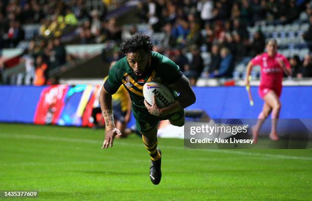 Josh Addo-Carr of Australia goes over to score their sides six try during the Rugby League World Cup 2021 Pool B match between Australia and Scotland...