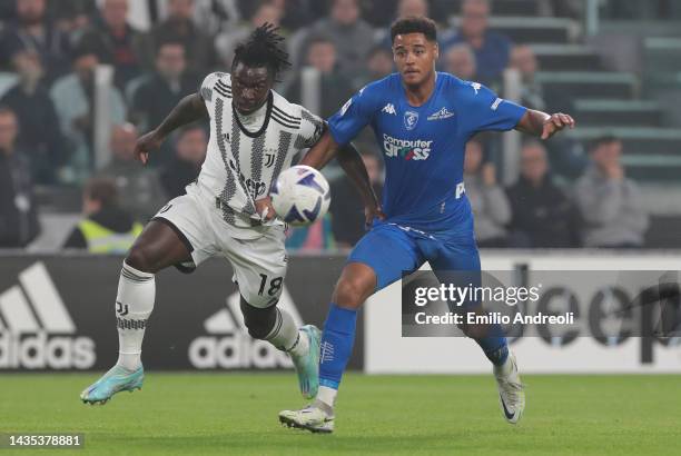 Moise Kean of Juventus battles for the ball with Koni De Winter of Empoli FC during the Serie A match between Juventus and Empoli FC at Allianz...