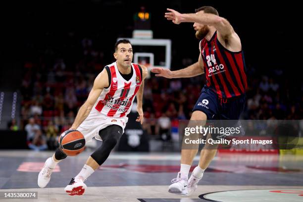 Kostas Sloukas of Olympiacos Piraeus hurt for the ball with Matt Costello of Cazoo Baskonia Vitoria Gasteiz during the 2022/2023 Turkish Airlines...