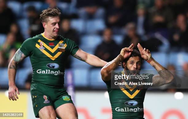 Josh Addo-Carr of Australia scores their hat trick try and their sides tenth try during the Rugby League World Cup 2021 Pool B match between...