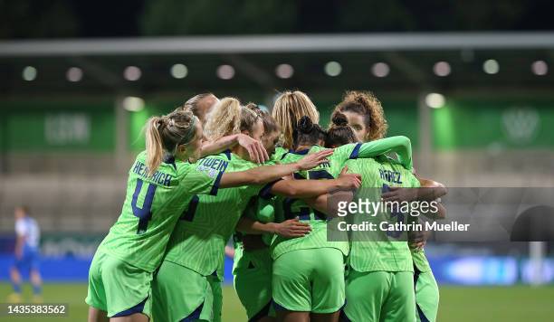 The Players of VfL Wolfsburg celebrate after scoring their sides first goal during the UEFA Women's Champions League group B match between VfL...