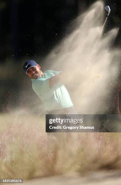 Jason Day of Australia plays a shot from a bunker on the 13th hole during the second round of the CJ Cup at Congaree Golf Club on October 21, 2022 in...