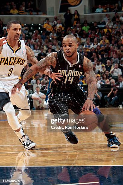 Jameer Nelson of the Orlando Magic handles the ball against George Hill of the Indiana Pacers in Game One of the Eastern Conference Quarterfinals...