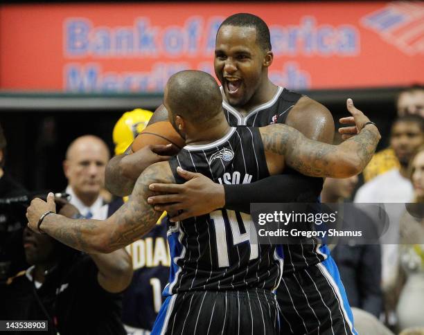 Glen Davis of the Orlando Magic celebrates a 81-77 victory over the Indiana Pacers with Jameer Nelson in Game One of the Eastern Conference...