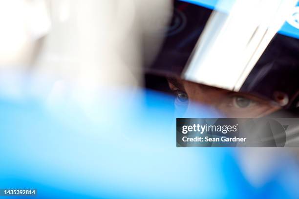 Stewart Friesen, driver of the Halmar International Toyota, sits in his car during practice for the NASCAR Camping World Truck Series Baptist Health...