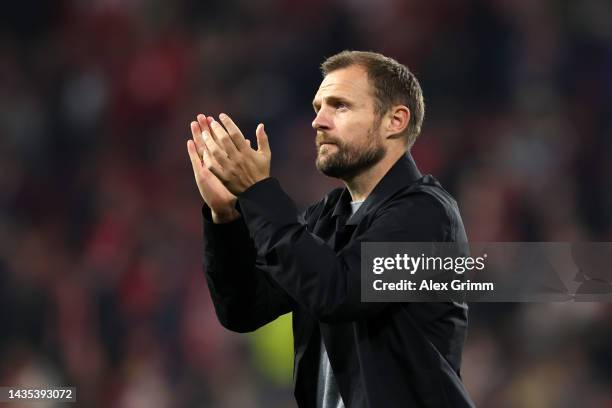 Bo Svensson, Head Coach of 1. FSV Mainz 05 applauds fans following their side's victory in the Bundesliga match between 1. FSV Mainz 05 and 1. FC...