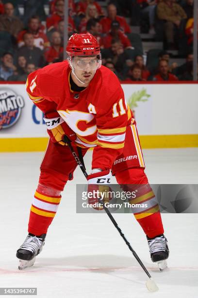 Mikael Backlund of the Calgary Flames prepares to face off against the Vegas Golden Knights at Scotiabank Saddledome on October 18, 2022 in Calgary,...