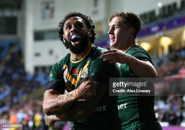 Josh Addo-Carr of Australia celebrates their sides sixth try with team mates during the Rugby League World Cup 2021 Pool B match between Australia...