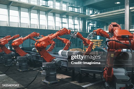 Operai robot in fabbrica Operai robot in fabbrica