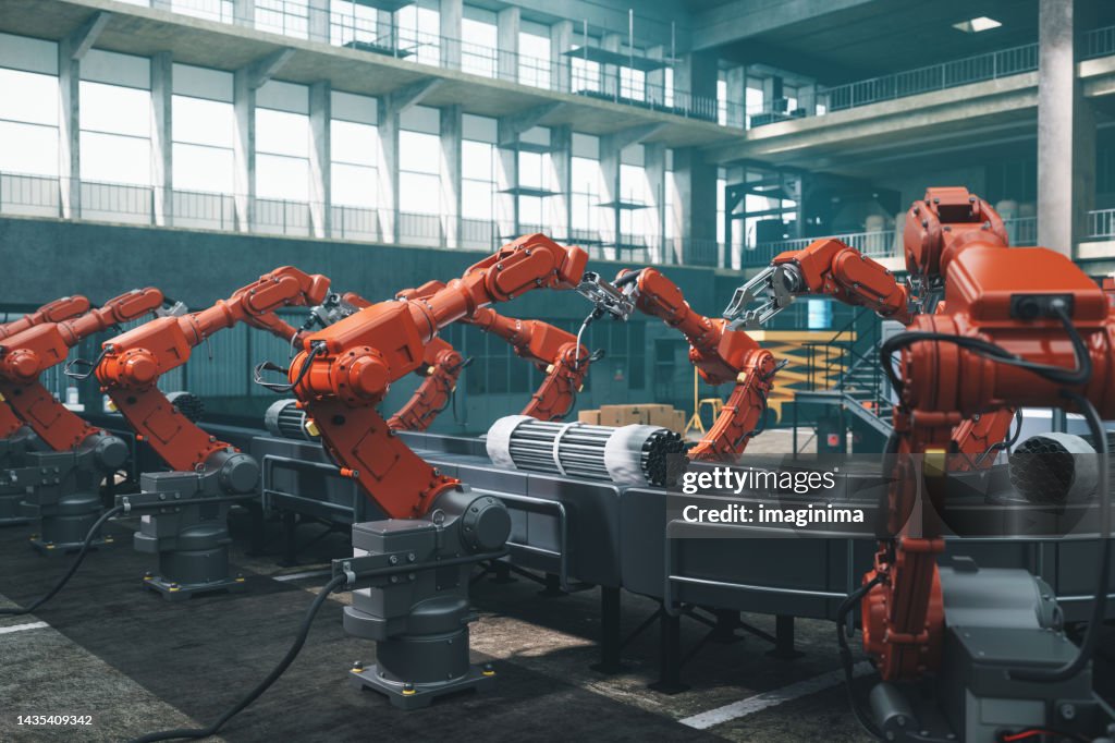 Robot Workers In Factory
