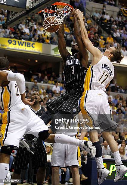 Earl Clark of the Orlando Magic gets in for a dunk next to Louis Amundson of the Indiana Pacers in Game One of the Eastern Conference Quarterfinals...