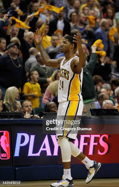 Paul George of the Indiana Pacers tries to pump up the fans while playing the Orlando Magic in Game One of the Eastern Conference Quarterfinals...