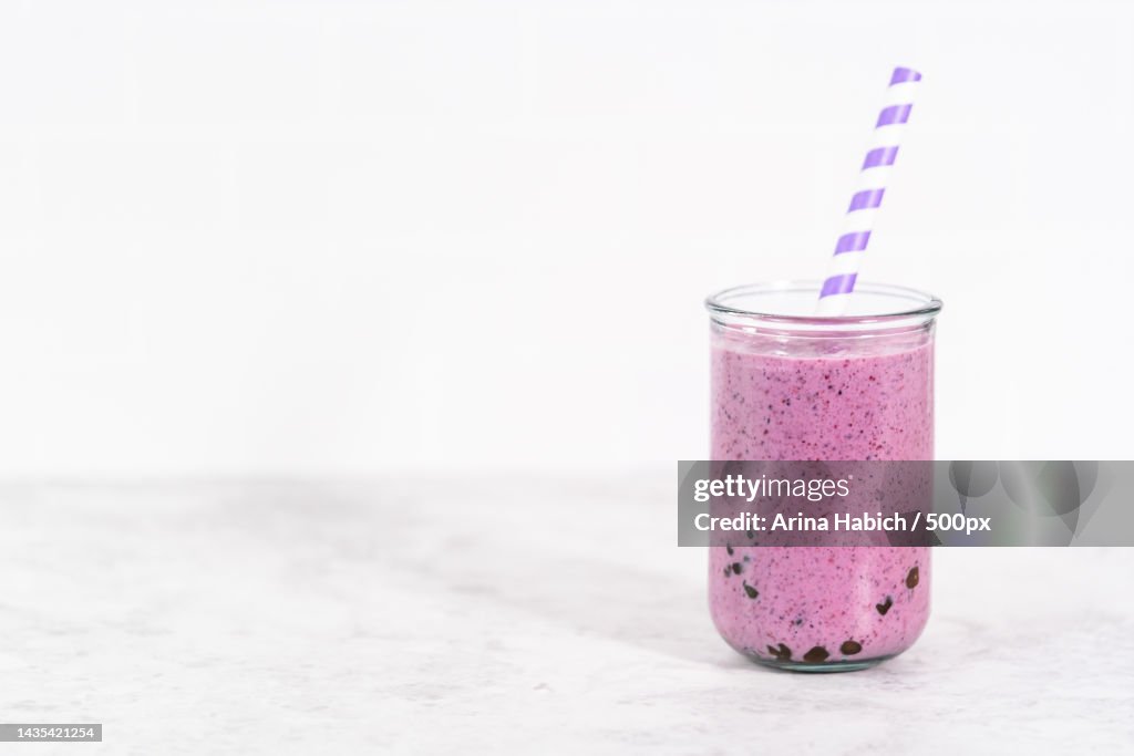 Close-up of smoothie in glass on table