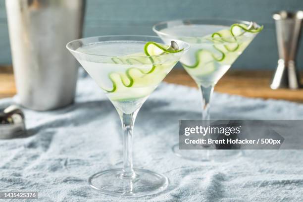 homemade japanese sake cucumber martini cocktail - cucumber cocktail stock pictures, royalty-free photos & images