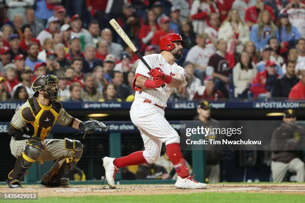 Kyle Schwarber of the Philadelphia Phillies hits a solo home run during the first inning against the San Diego Padres in game three of the National...