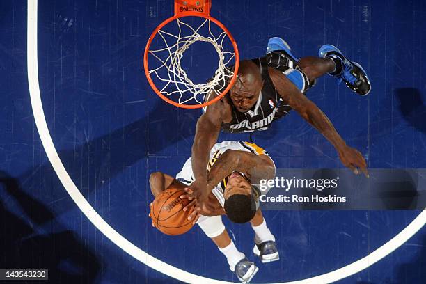 Jason Richardson of the Orlando Magic attempts to block a shot by Paul George of the Indiana Pacers in Game One of the Eastern Conference...