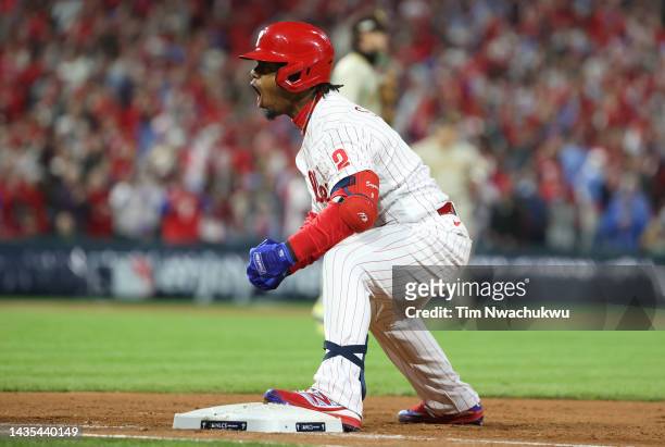 Jean Segura of the Philadelphia Phillies celebrates after hitting a two-run RBI single during the fourth inning against the San Diego Padres in game...