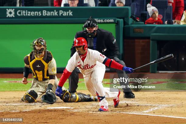 Jean Segura of the Philadelphia Phillies hits a two-run RBI single during the fourth inning against the San Diego Padres in game three of the...