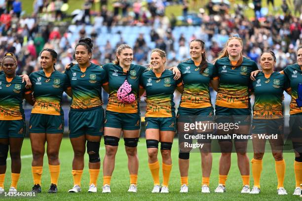 Team Australia are seen during the national anthem prior to the Pool A Rugby World Cup 2021 match between Australia and Wales at Northland Events...