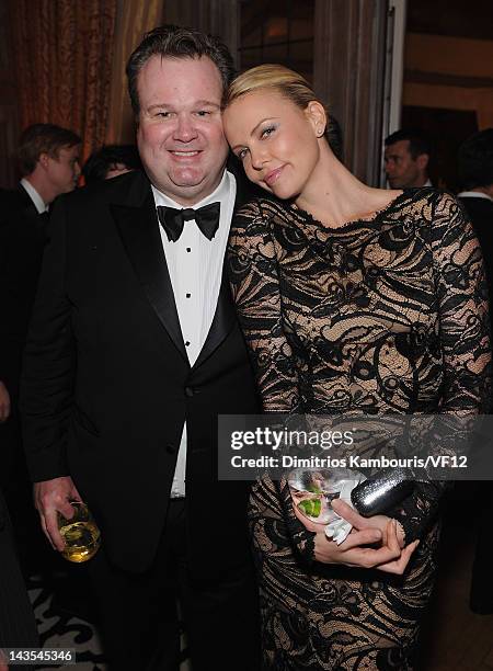 Eric Stonestreet and Charlize Theron attend the Bloomberg & Vanity Fair cocktail reception following the 2012 White House Correspondents' Association...