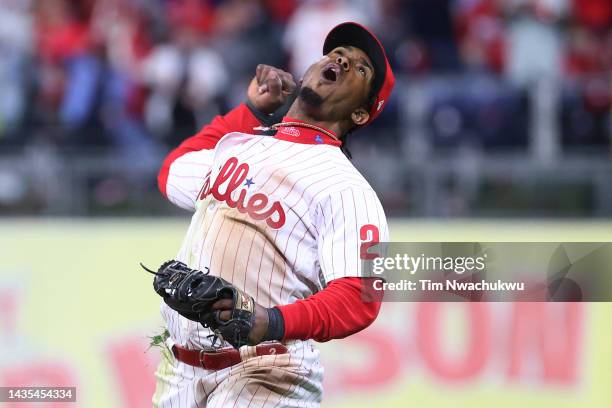 Jean Segura of the Philadelphia Phillies celebrates after making a diving stop and throwing out Ha-Seong Kim of the San Diego Padres at first base...