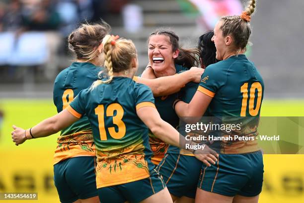 Michaela Leonard of Australia and team mates celebrate the try of Iliseva Batibasaga of Australia during the Pool A Rugby World Cup 2021 match...