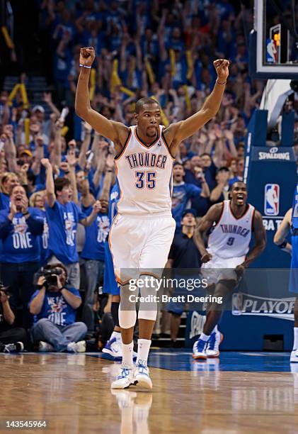 Kevin Durant of the Oklahoma City Thunder celebrates making the winning shot against the Dallas Mavericks in Game One of the Western Conference...